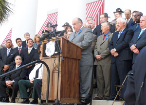 John Rivera at podium