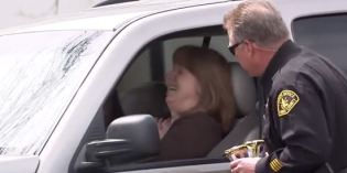 Cops pull people over and hand out ice cream cones.