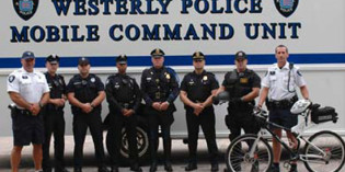 Officers Sue Town Over Dues